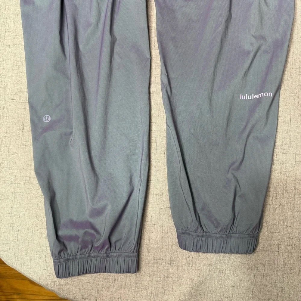Lululemon Iridescent Tearaway Mid Rise Track Pant Tidewater Teal Purple 12 NWT